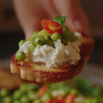 Charred lemon peas with feta recipe